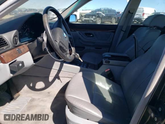 2001 BMW 7 Series 740iL с VIN WBAGH83451DP26142, выставлен на аукционе Copart как лот 51019705 с пробегом Не указан миль и Списание • Salvage title. История ставок и продаж доступна на DreamBid. Изображение 7.