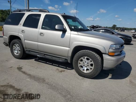 2005 Chevrolet Tahoe Z71 with VIN 1GNEK13T95R157497, listed as a Copart auction lot 70390345 with 246,615 mi miles and Salvage title. Bid and sale history available at DreamBid. Image 4.