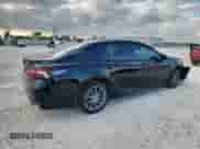 2023 Toyota Camry Hybrid SE with VIN 4T1T31AK4PU047945, listed as a Copart auction lot 86823265 with 58,221 mi miles and Salvage title. Bid and sale history available at DreamBid. Image 3.