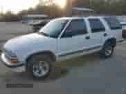 1999 Chevrolet Blazer LS z VIN 1GNCS13W1X2162495, wystawiony jako Copart lot #80019274 z przebiegiem Nie podano mil oraz Szkoda całkowita • Salvage title. Historia ofert i sprzedaży dostępna na DreamBid. Obrazek 1.