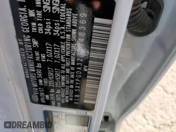 2018 Kia Sorento LX z VIN 5XYPGDA32JG348369, wystawiony jako Copart lot #81933265 z przebiegiem 96 892 mil mil oraz Szkoda całkowita • Salvage title. Historia ofert i sprzedaży dostępna na DreamBid. Obrazek 13.