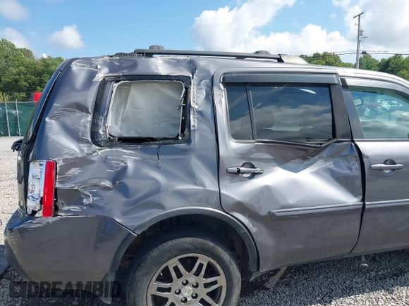 2014 Honda Pilot EX-L with VIN 5FNYF4H54EB023024, listed as a IAAI auction lot 43023941 with 155,356 mi miles and . Bid and sale history available at DreamBid. Image 18.