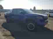 2025 Toyota Tacoma TRD Sport Hybrid with VIN 3TYLC5LN4ST017784, listed as a Copart auction lot 80697695 with 8,347 mi miles and Salvage title. Bid and sale history available at DreamBid. Image 4.