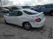 2000 Hyundai Tiburon с VIN KMHJG35F9YU191917, выставлен на аукционе Copart как лот 79629394 с пробегом 179 948 миль миль и Списание • Salvage title. История ставок и продаж доступна на DreamBid. Изображение 2.