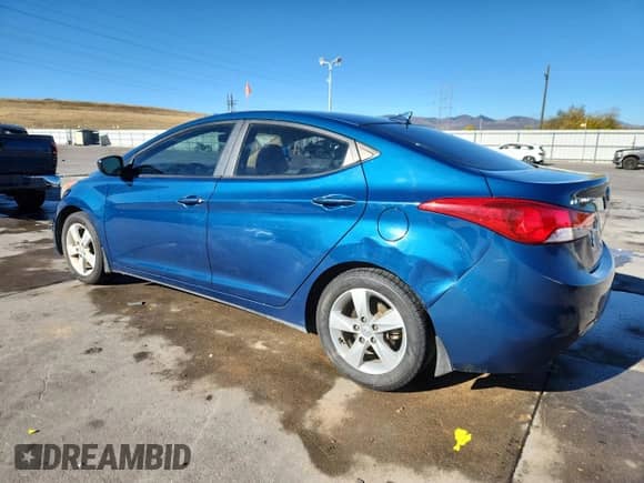 2013 Hyundai Elantra GLS z VIN KMHDH4AE4DU973825, wystawiony jako Copart lot #87290095 z przebiegiem 170 356 mil mil oraz Szkoda całkowita • Salvage title. Historia ofert i sprzedaży dostępna na DreamBid. Obrazek 2.