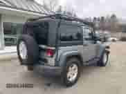 2013 Jeep Wrangler Sport with VIN 1C4AJWAG7DL605881, listed as a IAAI auction lot 41980930 with 214,662 mi miles and . Bid and sale history available at DreamBid. Image 4.