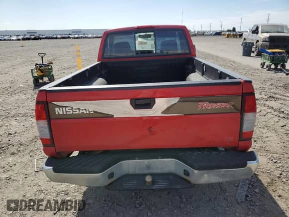 1998 Nissan Frontier XE z VIN 1N6DD21S2WC364538, wystawiony jako Copart lot #62867545 z przebiegiem 261 987 mil mil oraz Szkoda całkowita • Salvage title. Historia ofert i sprzedaży dostępna na DreamBid. Obrazek 6.