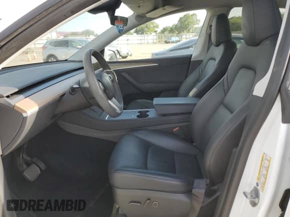 2023 Tesla Model Y Long Range with VIN 7SAYGDEE8PA068598, listed as a Copart auction lot 84741425 with 53,598 mi miles and Salvage title. Bid and sale history available at DreamBid. Image 7.