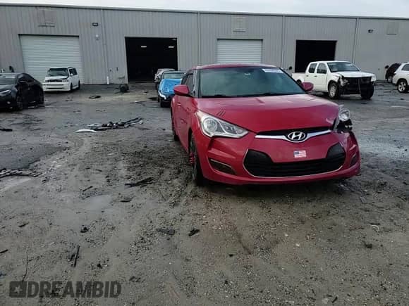 2013 Hyundai Veloster w/Gray Int z VIN KMHTC6AD9DU138767, wystawiony jako Copart lot #85260395 z przebiegiem 176 745 mil mil oraz Szkoda całkowita • Salvage title. Historia ofert i sprzedaży dostępna na DreamBid. Obrazek 13.