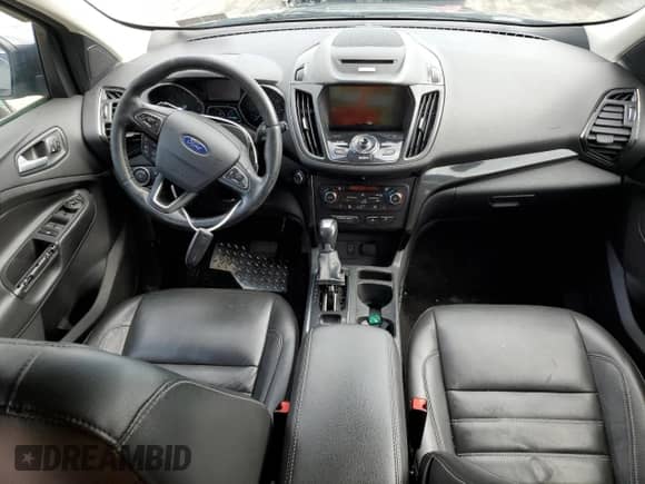 2017 Ford Escape Titanium с VIN 1FMCU9JD9HUB78027, выставлен на аукционе Copart как лот 61506485 с пробегом 137 565 миль миль и Чистый • Clean title. История ставок и продаж доступна на DreamBid. Изображение 8.