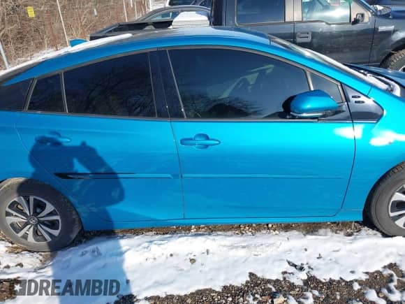 2018 Toyota Prius Plus z VIN JTDKARFP2J3069383, wystawiony jako IAAI lot #41595534 z przebiegiem 164 481 mil mil oraz . Historia ofert i sprzedaży dostępna na DreamBid. Obrazek 13.