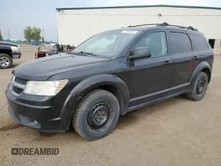 2010 Dodge Journey SXT with VIN 3D4PG5FV6AT111590, listed as a Copart auction lot 72005885 with 222,918 mi miles and Salvage title. Bid and sale history available at DreamBid. Image 1.