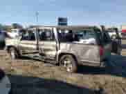 1999 Chevrolet Suburban with VIN 1GNFK16R9XJ570798, listed as a Copart auction lot 84502844 with 316,003 mi miles and Salvage title. Bid and sale history available at DreamBid. Image 2.