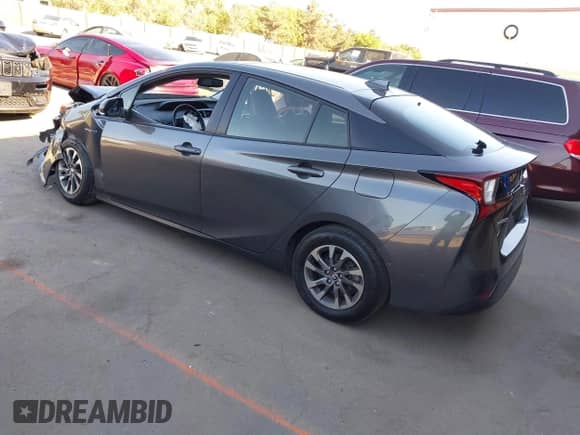 2022 Toyota Prius Nightshade with VIN JTDKAMFU4N3155017, listed as a IAAI auction lot 43013402 with 146,084 mi miles and . Bid and sale history available at DreamBid. Image 3.