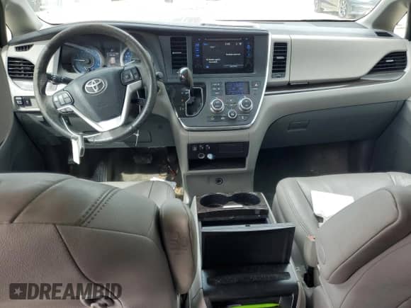 2015 Toyota Sienna XLE с VIN 5TDYK3DC9FS578672, выставлен на аукционе Copart как лот 82374545 с пробегом 167 324 миль миль и Списание • Salvage title. История ставок и продаж доступна на DreamBid. Изображение 8.