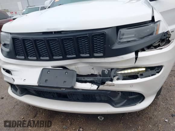 2016 Jeep Grand Cherokee SRT with VIN 1C4RJFDJ0GC456325, listed as a IAAI auction lot 41425211 with 159,746 mi miles and . Bid and sale history available at DreamBid. Image 6.