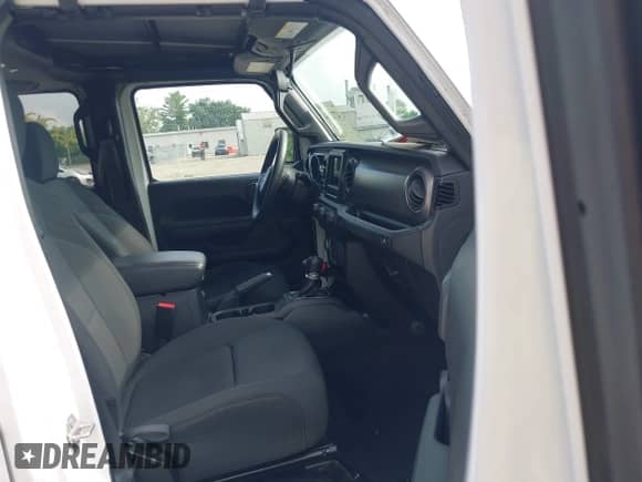 2023 Jeep Wrangler Sport S with VIN 1C4HJXDN9PW530537, listed as a IAAI auction lot 42713834 with 11,280 mi miles and . Bid and sale history available at DreamBid. Image 5.