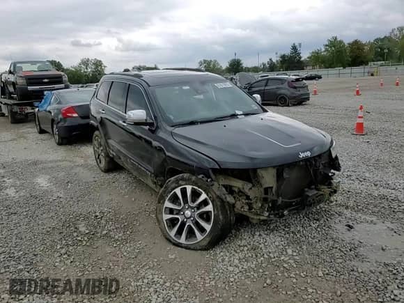 2017 Jeep Grand Cherokee Overland with VIN 1C4RJFCG7HC684748, listed as a Copart auction lot 81811815 with 72,945 mi miles and Salvage title. Bid and sale history available at DreamBid. Image 14.
