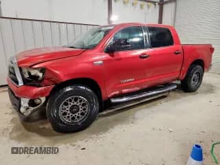 2012 Toyota Tundra z VIN 5TFEY5F13CX118793, wystawiony jako Copart lot #86106055 z przebiegiem 163 725 mil mil oraz Czysty tytuł • Clean title. Historia ofert i sprzedaży dostępna na DreamBid. Obrazek 1.
