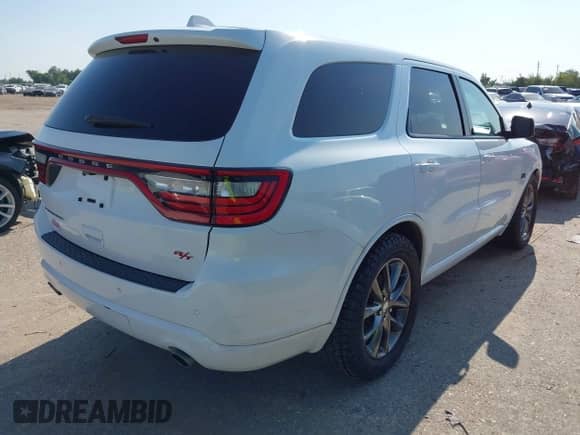 2014 Dodge Durango R/T with VIN 1C4SDHCT6EC332080, listed as a IAAI auction lot 43183223 with 186,190 mi miles and . Bid and sale history available at DreamBid. Image 4.