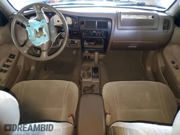 2001 Toyota Tacoma PreRunner z VIN 5TEGN92N71Z859665, wystawiony jako Copart lot #84799325 z przebiegiem 202 008 mil mil oraz Szkoda całkowita • Salvage title. Historia ofert i sprzedaży dostępna na DreamBid. Obrazek 8.