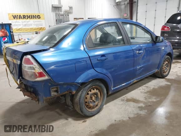 2007 Chevrolet Aveo LS with VIN KL1TD56637B136946, listed as a IAAI auction lot 42841886 with 108,266 mi miles and . Bid and sale history available at DreamBid. Image 4.