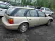 1997 Saturn SW with VIN 1G8ZK827XVZ120119, listed as a Copart auction lot 57083245 with 199,971 mi miles and Salvage title. Bid and sale history available at DreamBid. Image 3.