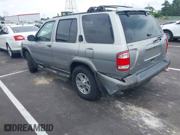 2001 Nissan Pathfinder SE z VIN JN8DR07Y91W504858, wystawiony jako IAAI lot #42451823 z przebiegiem 185 336 mil mil oraz . Historia ofert i sprzedaży dostępna na DreamBid. Obrazek 3.