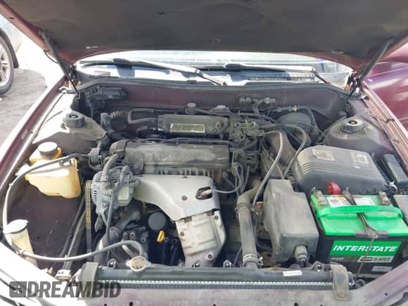 1996 Toyota Camry DX z VIN 4T1BG12K5TU756036, wystawiony jako IAAI lot #43304027 z przebiegiem 128 756 mil mil oraz . Historia ofert i sprzedaży dostępna na DreamBid. Obrazek 10.