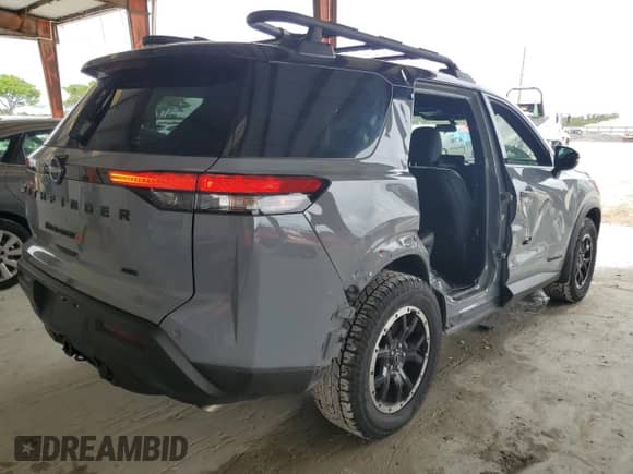 2024 Nissan Pathfinder Rock Creek с VIN 5N1DR3BD5RC305137, выставлен на аукционе Copart как лот 71536345 с пробегом 12 626 миль миль и Списание • Salvage title. История ставок и продаж доступна на DreamBid. Изображение 3.