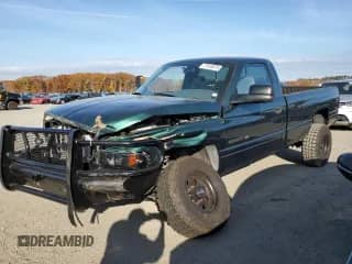 2002 Dodge RAM with VIN 3B7KF26W22M285766, listed as a Copart auction lot 77415574 with 12,275 mi miles and Clean title. Bid and sale history available at DreamBid. Image 1.