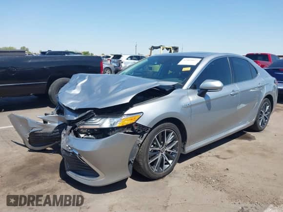 2021 Toyota Camry Hybrid XLE with VIN 4T1F31AK2MU547062, listed as a IAAI auction lot 42405027 with 170,899 mi miles and . Bid and sale history available at DreamBid. Image 17.