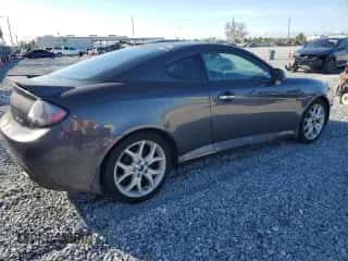 2008 Hyundai Tiburon GT с VIN KMHHN66F08U285480, выставлен на аукционе Copart как лот 43611875 с пробегом 171 060 миль миль и Чистый • Clean title. История ставок и продаж доступна на DreamBid. Изображение 3.