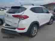 2016 Hyundai Tucson Sport with VIN KM8J33A22GU242249, listed as a IAAI auction lot 43444641 with 117,553 mi miles and . Bid and sale history available at DreamBid. Image 4.