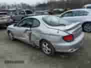 2001 Hyundai Tiburon с VIN KMHJG35F31U224416, выставлен на аукционе Copart как лот 83243684 с пробегом 59 473 миль миль и Списание • Salvage title. История ставок и продаж доступна на DreamBid. Изображение 2.