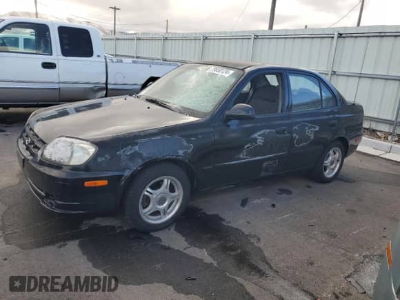 2003 Hyundai Accent GL с VIN KMHCG45C43U429167, выставлен на аукционе Copart как лот 79658124 с пробегом 80 926 миль миль и Чистый • Clean title. История ставок и продаж доступна на DreamBid. Изображение 1.
