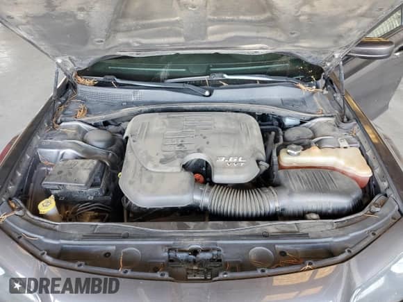 2016 Chrysler 300 S with VIN 2C3CCABG4GH233829, listed as a Copart auction lot 70194295 with 221,664 mi miles and Salvage title. Bid and sale history available at DreamBid. Image 11.