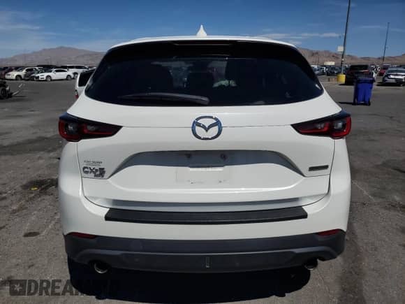 2022 Mazda CX-5 S Select z VIN JM3KFBBM2N0566257, wystawiony jako Copart lot #70037015 z przebiegiem 46 292 mil mil oraz Szkoda całkowita • Salvage title. Historia ofert i sprzedaży dostępna na DreamBid. Obrazek 6.