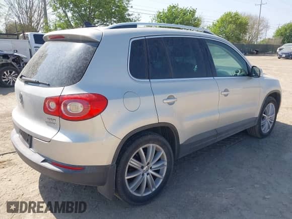 2011 Volkswagen Tiguan S with VIN WVGBV7AX9BW524886, listed as a IAAI auction lot 41828847 with 199,813 mi miles and . Bid and sale history available at DreamBid. Image 4.