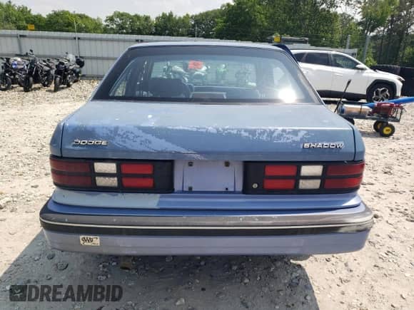 1992 Dodge Shadow with VIN 1B3XP48KXNN262238, listed as a Copart auction lot 61809755 with 108,984 mi miles and Clean title. Bid and sale history available at DreamBid. Image 6.
