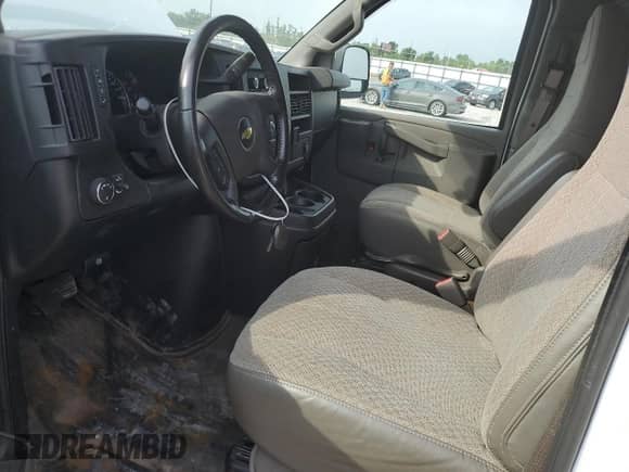 2021 Chevrolet Express Cargo with VIN 1GCWGAF77M1159386, listed as a Copart auction lot 80967735 with 75,761 mi miles and Salvage title. Bid and sale history available at DreamBid. Image 7.