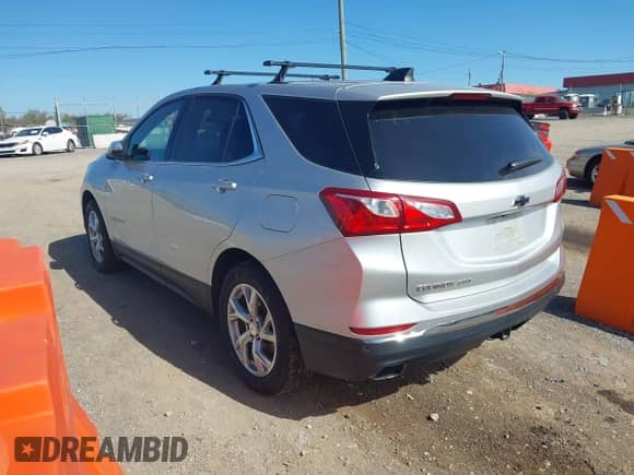 2018 Chevrolet Equinox LT with VIN 3GNAXKEX3JS523175, listed as a IAAI auction lot 43512143 with 123,328 mi miles and . Bid and sale history available at DreamBid. Image 3.