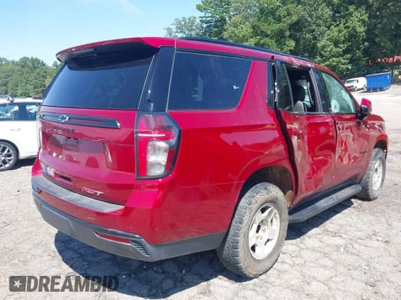 2023 Chevrolet Tahoe RST with VIN 1GNSCRKD9PR557300, listed as a IAAI auction lot 43087991 with 46,594 mi miles and . Bid and sale history available at DreamBid. Image 4.