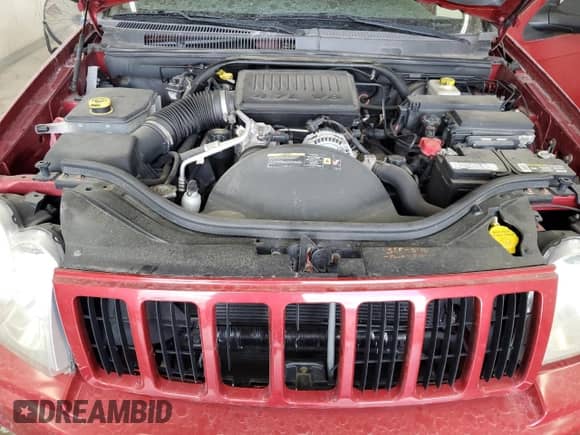 2006 Jeep Grand Cherokee Laredo with VIN 1J4HR48N96C330446, listed as a Copart auction lot 60747145 with 170,000 mi miles and Salvage title. Bid and sale history available at DreamBid. Image 12.