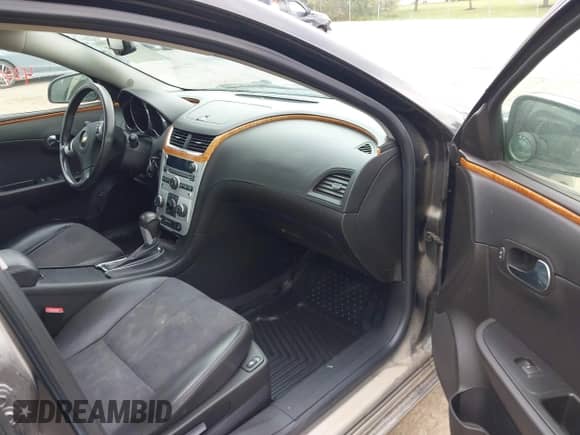 2012 Chevrolet Malibu 3LT z VIN 1G1ZF5E78CF182405, wystawiony jako IAAI lot #42496455 z przebiegiem 146 563 mil mil oraz . Historia ofert i sprzedaży dostępna na DreamBid. Obrazek 5.