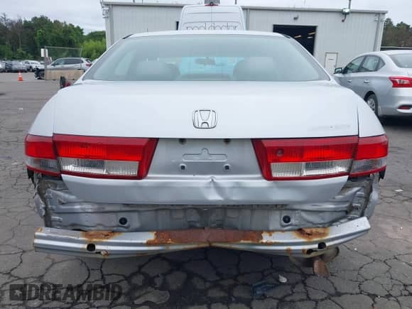 2004 Honda Accord EX with VIN 1HGCM56764A125766, listed as a IAAI auction lot 42571331 with 350,529 mi miles and . Bid and sale history available at DreamBid. Image 6.