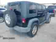 2008 Jeep Wrangler Unlimited X z VIN 1J4GA39148L612425, wystawiony jako IAAI lot #43266301 z przebiegiem 196 635 mil mil oraz . Historia ofert i sprzedaży dostępna na DreamBid. Obrazek 4.