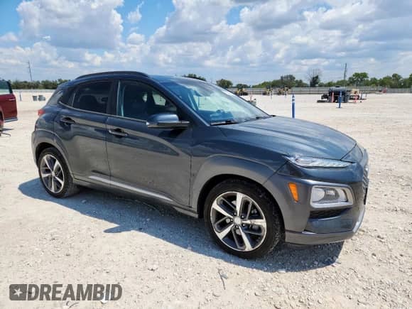 2020 Hyundai Kona Ultimate с VIN KM8K53A5XLU421139, выставлен на аукционе Copart как лот 71557165 с пробегом 128 218 миль миль и Списание • Salvage title. История ставок и продаж доступна на DreamBid. Изображение 4.