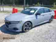 2022 Honda Accord Sport z VIN 1HGCV3F27NA029054, wystawiony jako IAAI lot #43146842 z przebiegiem 99 987 mil mil oraz . Historia ofert i sprzedaży dostępna na DreamBid. Obrazek 2.