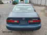 1997 Toyota Camry LE с VIN 4T1BG22K2VU069055, выставлен на аукционе Copart как лот 80131065 с пробегом 193 934 миль миль и Списание • Salvage title. История ставок и продаж доступна на DreamBid. Изображение 6.